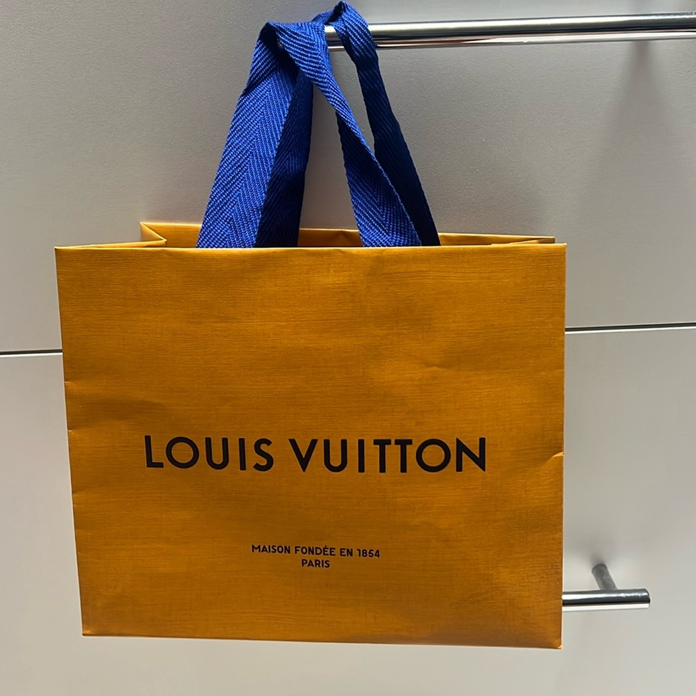 Louis Vuitton shopping bag and receipt card holder